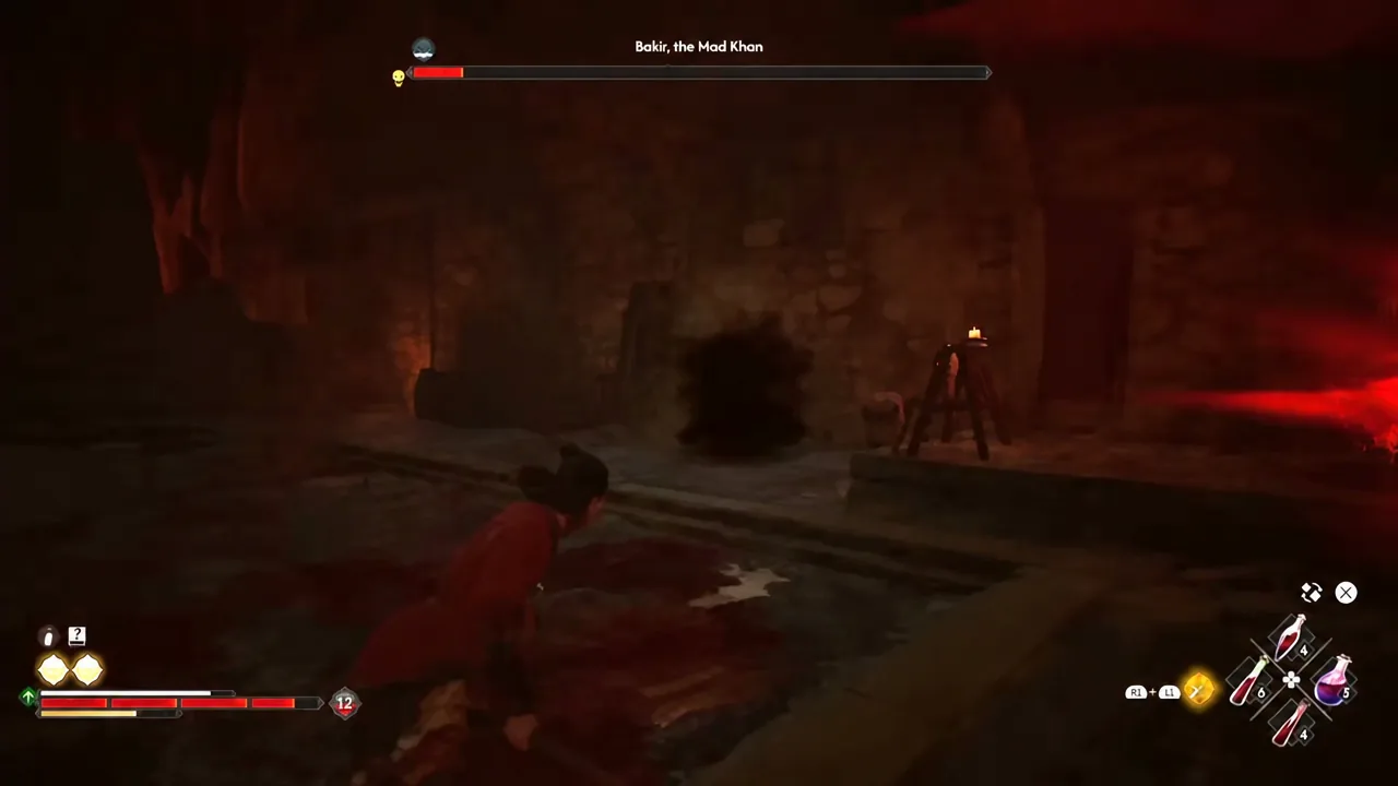 Bakir, the Mad Khan boss fight with his health bar nearly emptied as the player lands a strike