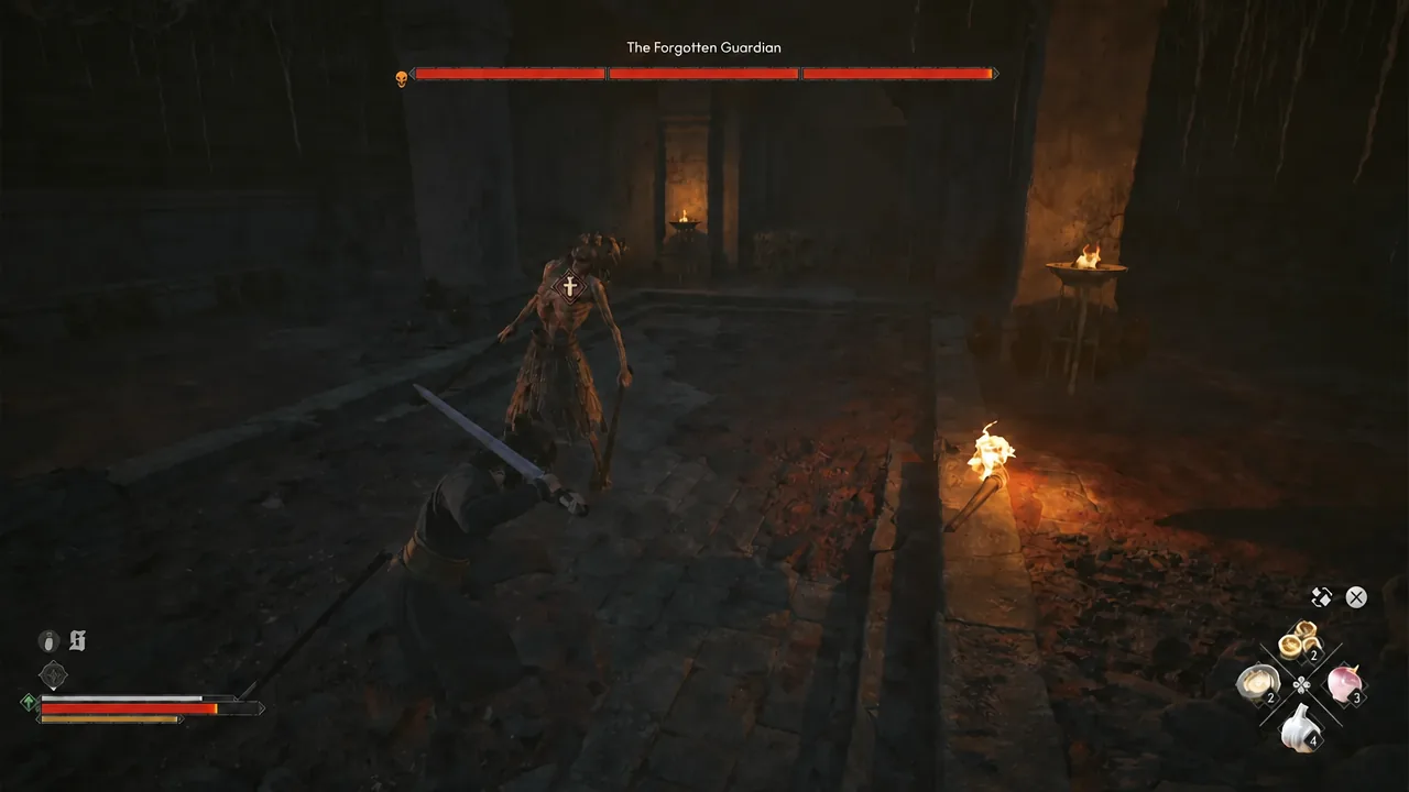Coen swinging at The Forgotten Guardian with the boss health bar shown at the top of the screen