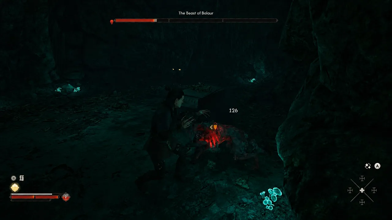 Coen striking the highlighted Beast of Balaur inside the cave arena as damage numbers appear