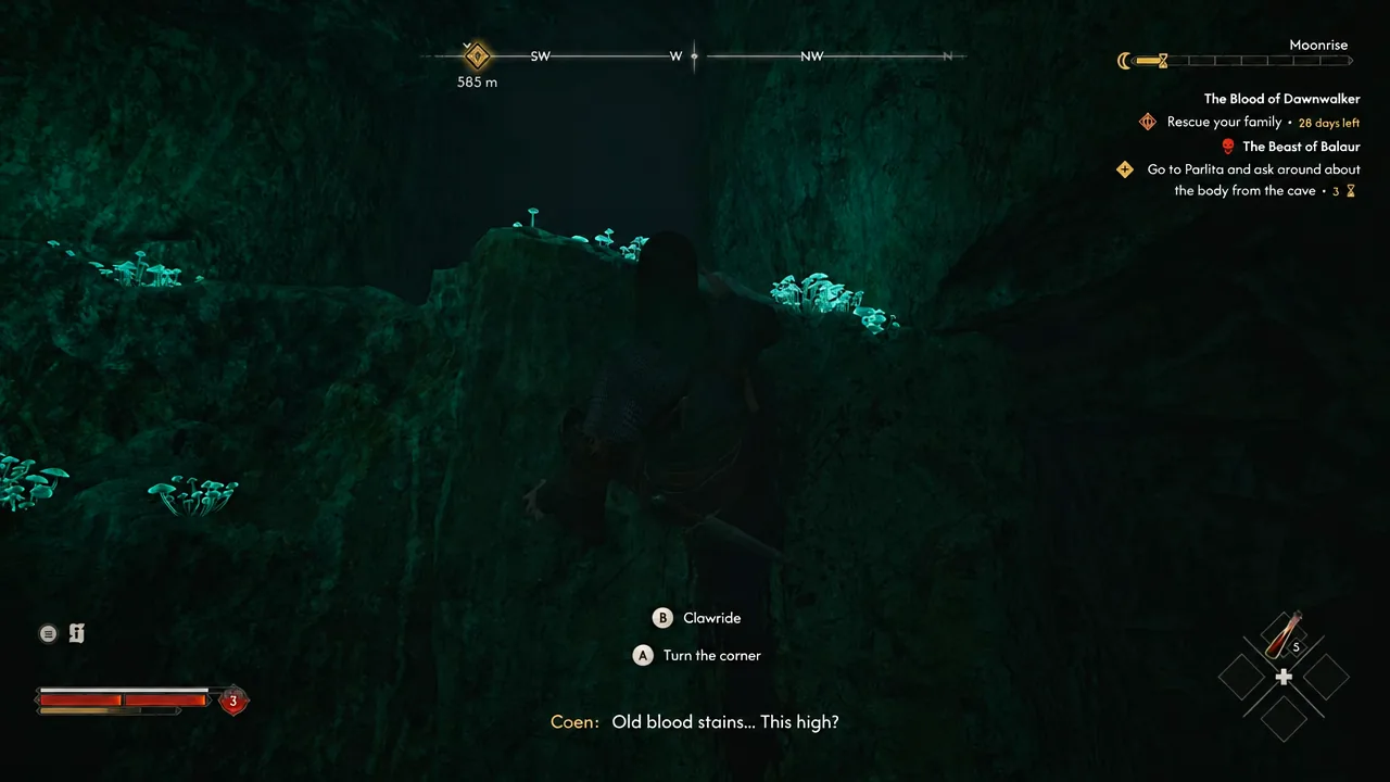 Clawride and turn the corner button prompts shown while climbing the cave wall