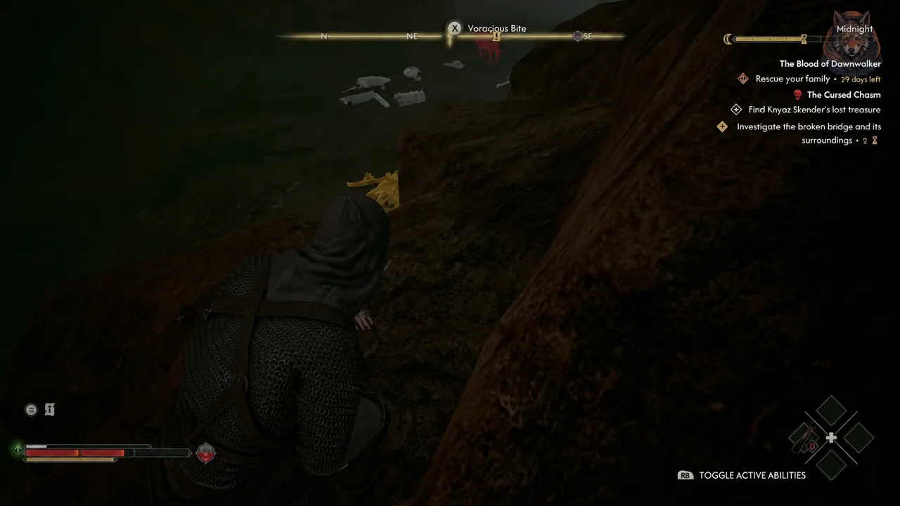 Voracious Bite prompt on screen while Coen crouches on the rocky slope at night