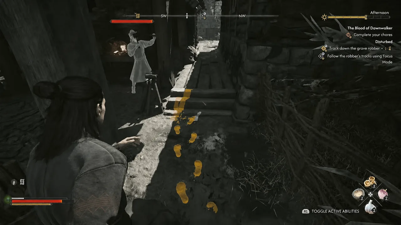 Focus Mode lighting up the grave robber's yellow footprints along a ruined stone wall
