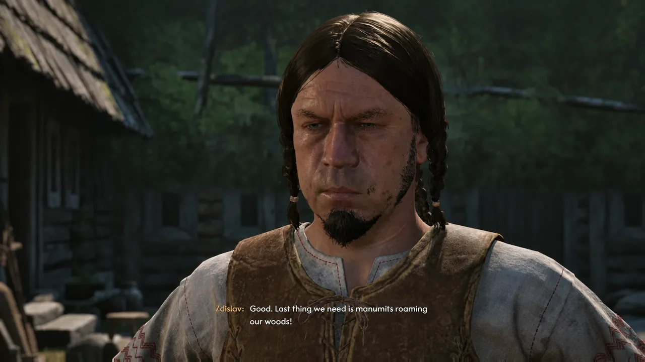 Zdislav mid-conversation in the village reacting to Coen's report about the woods