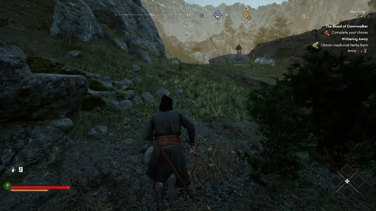Coen walking uphill toward a shrine with the prologue quest tracker visible on the right