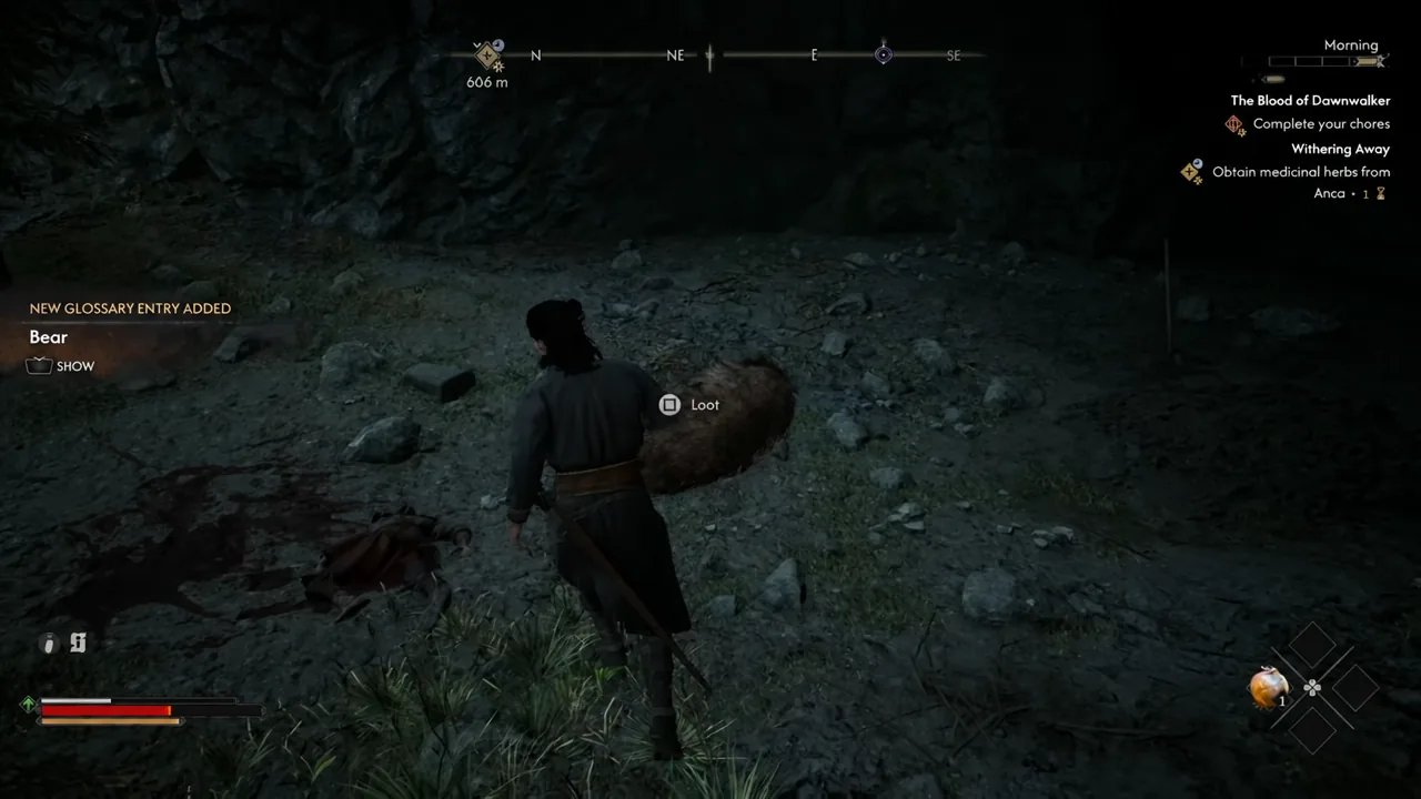 The Loot prompt highlighted on the dead bear's carcass after the fight