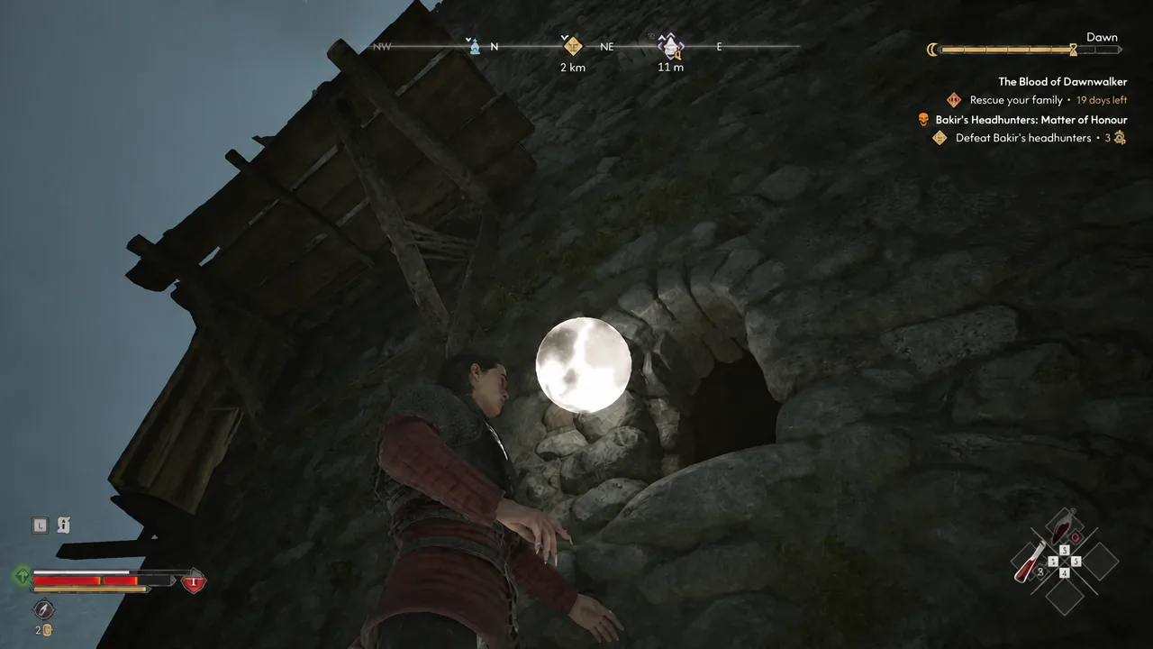 Glowing orb beside a rocky cave entrance during the climb up Silts Tower