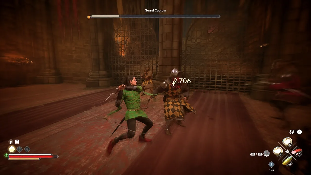 Guard Captain fight in a castle hall with a 2,706 damage hit registering on the enemy health bar