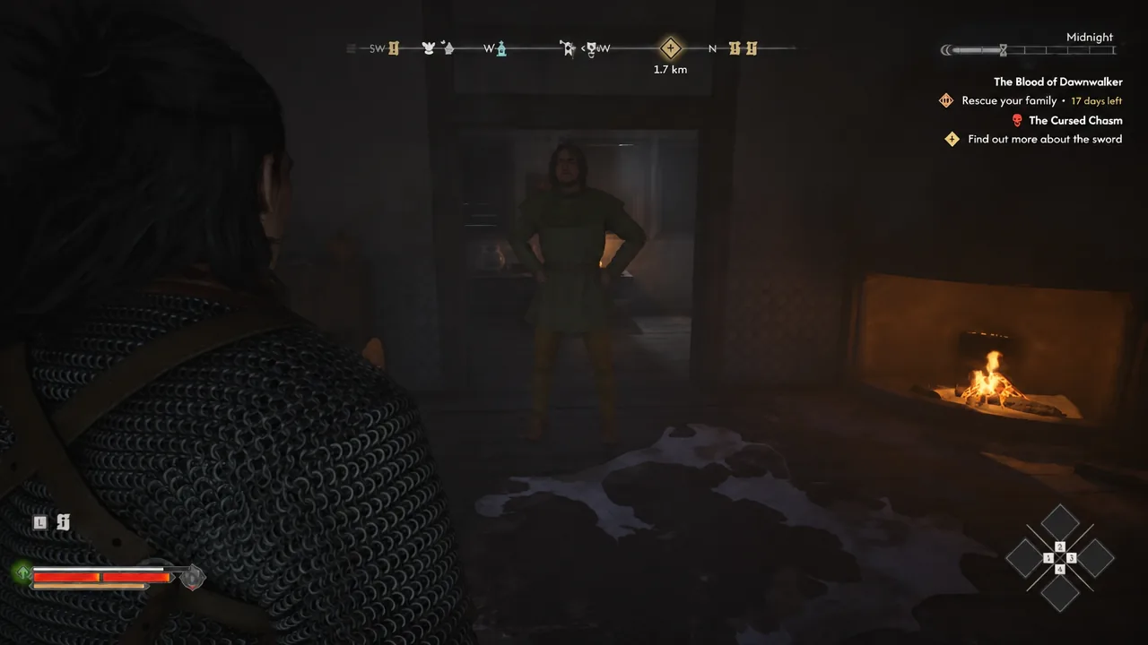 Coen approaching an NPC beside a lit fireplace inside a Svartrau City building