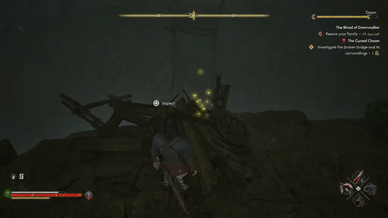 Inspect prompt highlighted over the wrecked cart at the edge of the collapsed bridge