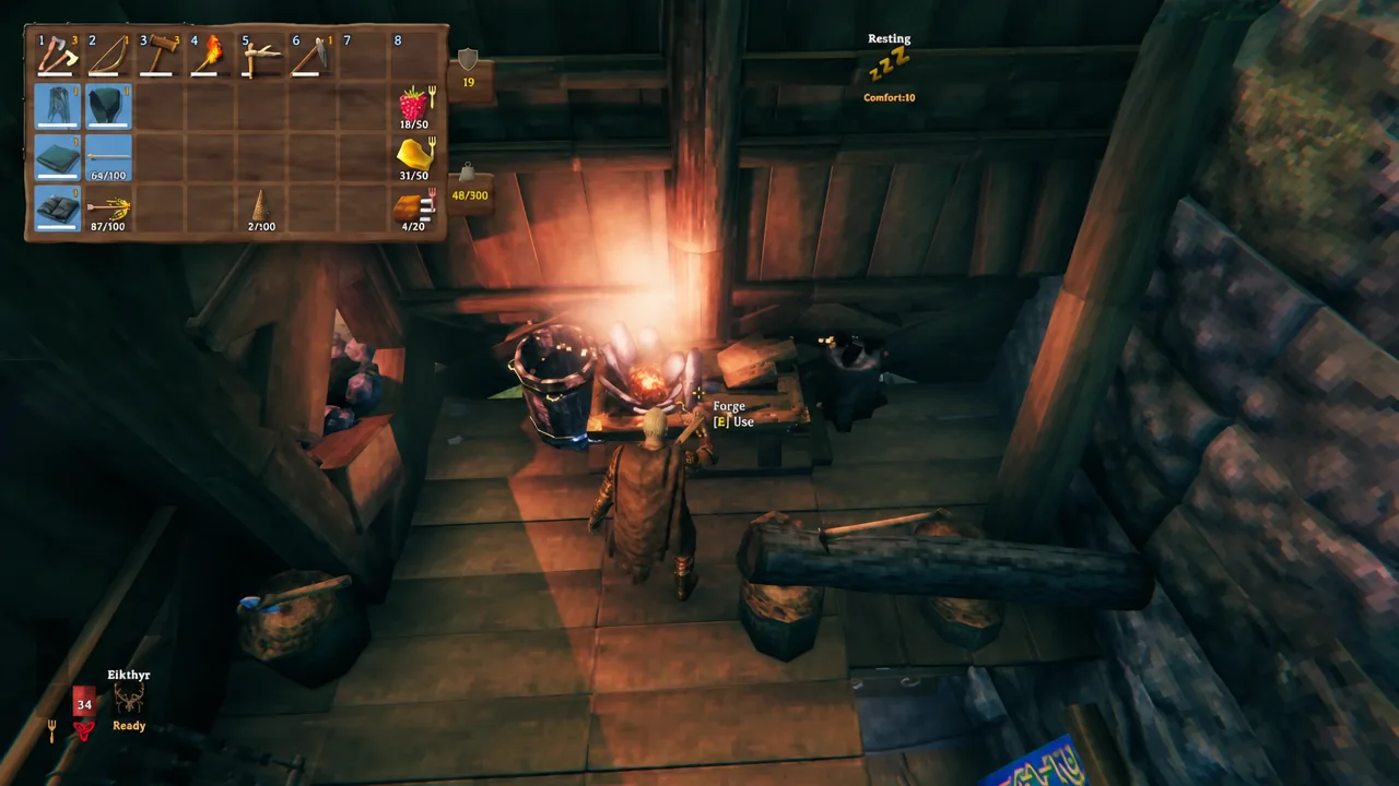 The Forge with an on-screen use prompt as the player steps up to craft bronze gear
