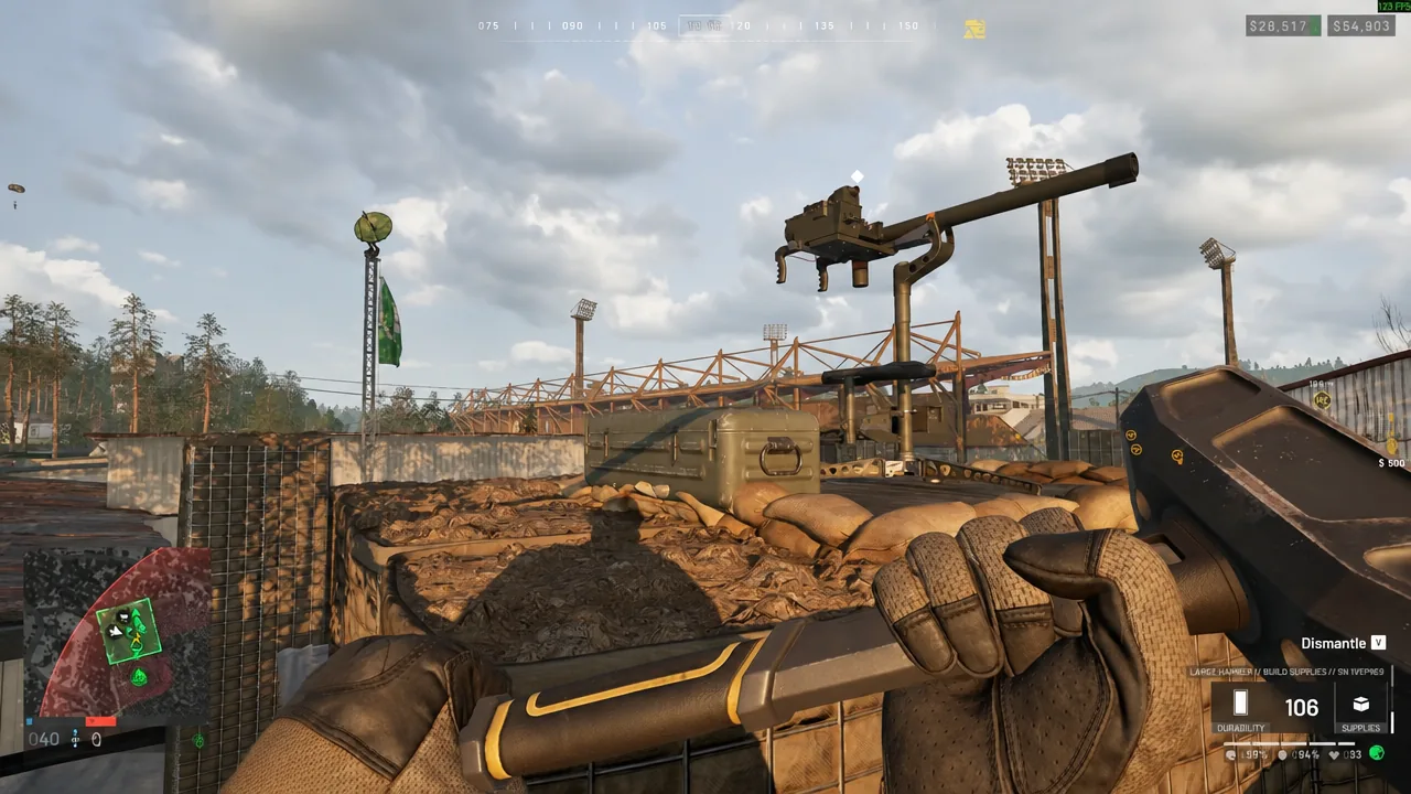 Support player working on FOB structures near a contested zone in Wardogs