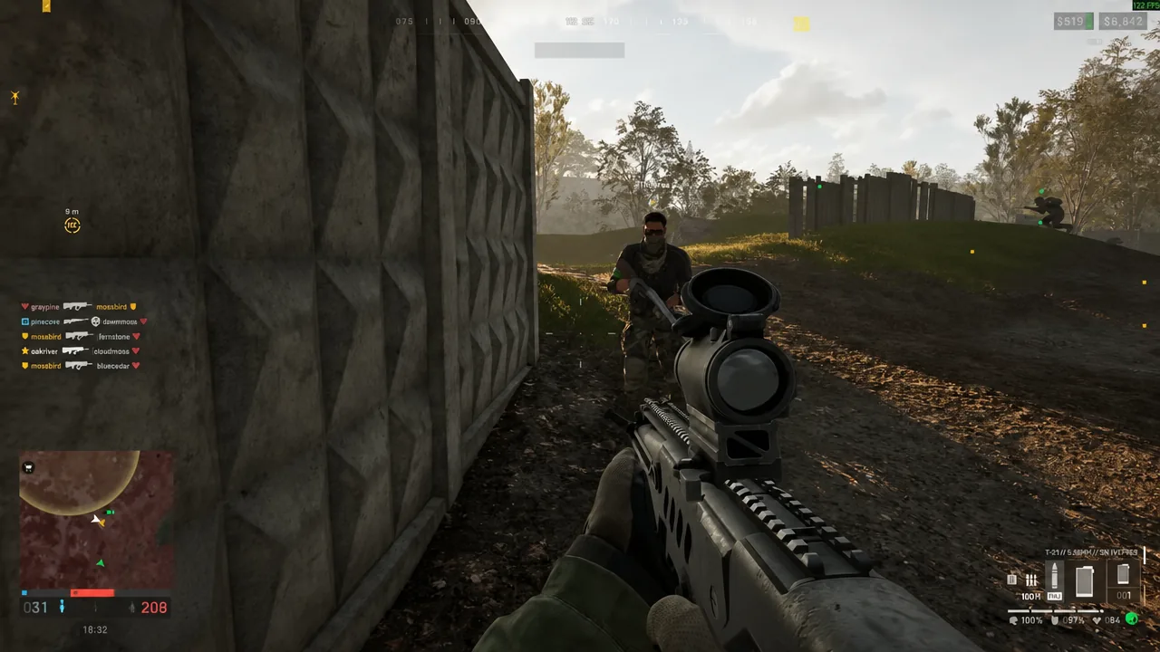 Player looking through a rifle scope at a teammate crouched beside a concrete wall
