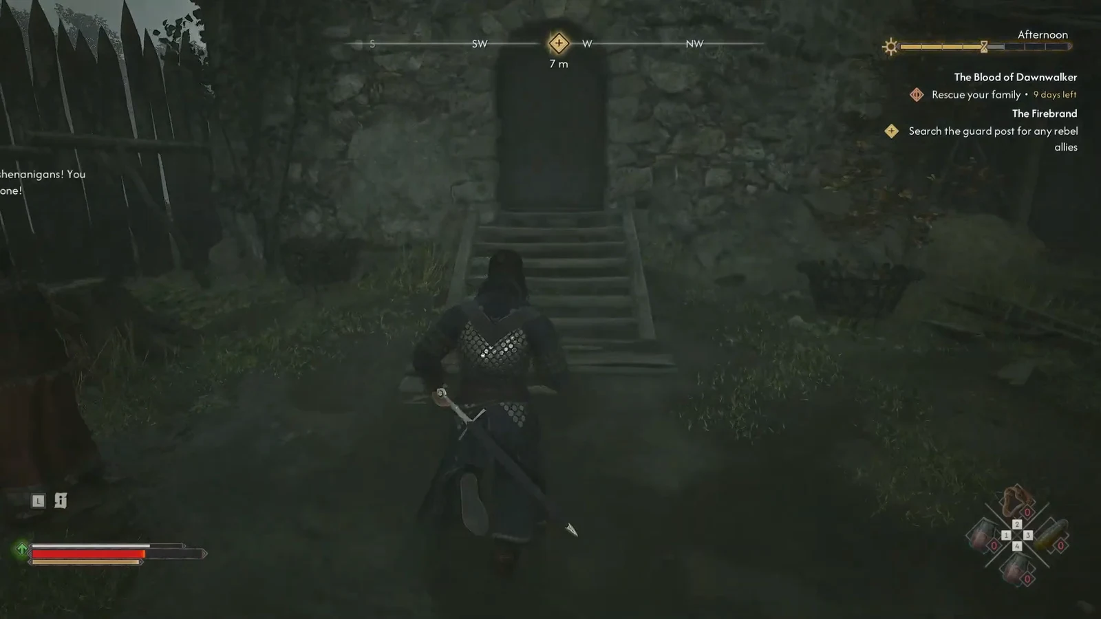 Coen climbing stone steps toward a dark tower doorway with the objective seven metres away