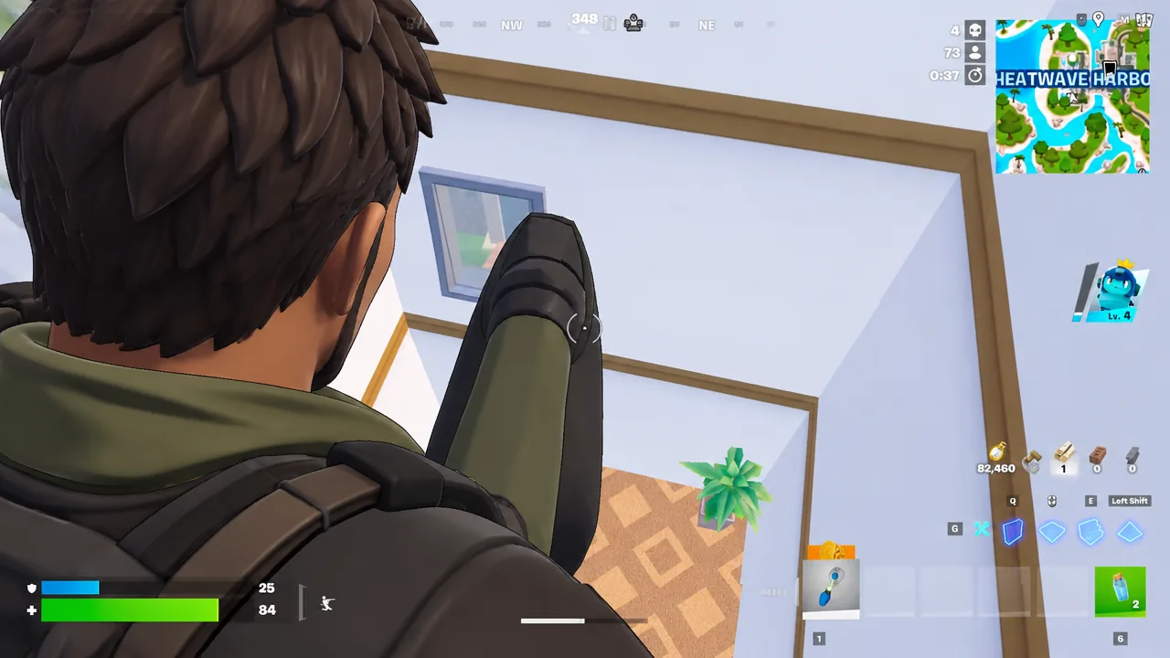 Player aiming inside a building with an inventory slot highlighted on the HUD
