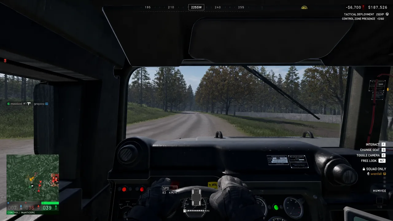 Driving a Humvee in WARDOGS with the dashboard, speed readout and minimap on screen