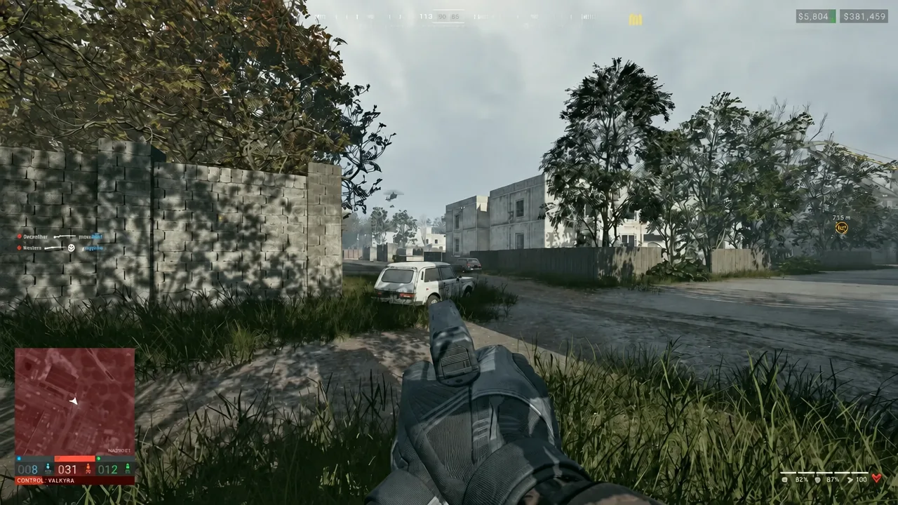 Player aiming a pistol down a street with the objective HUD and minimap on screen