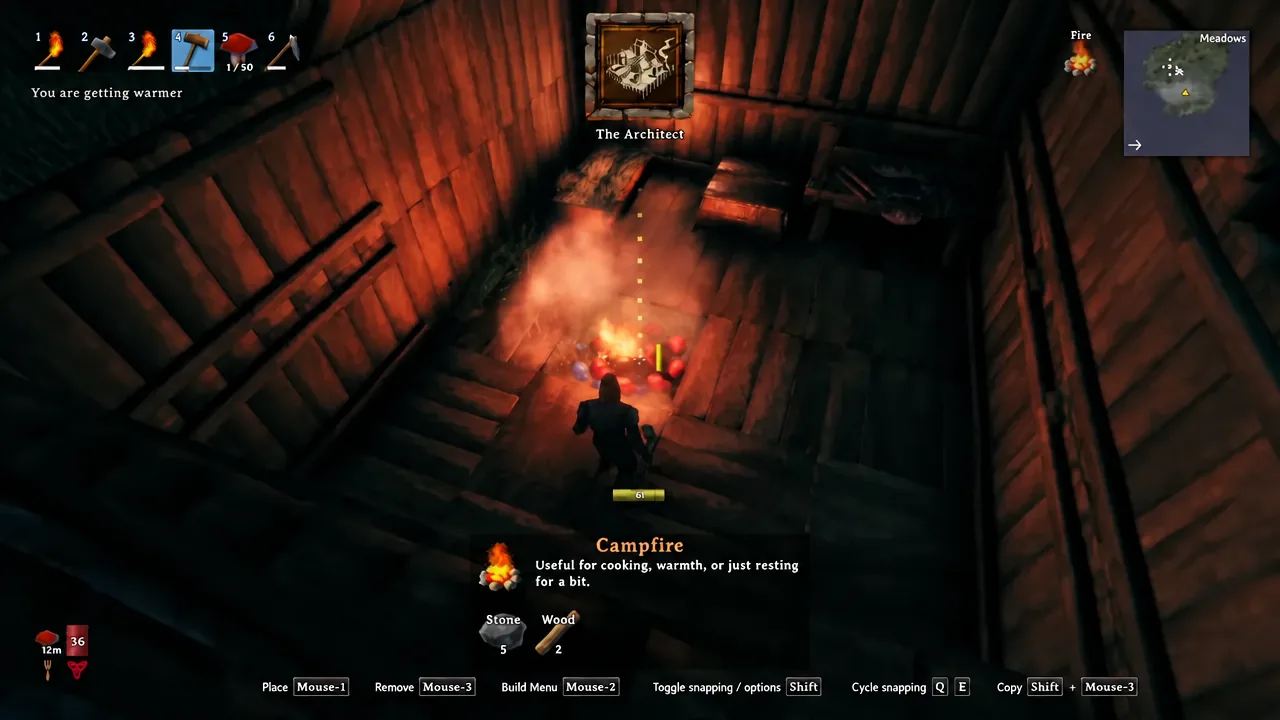 Campfire selected in the Valheim build menu with the placement preview showing