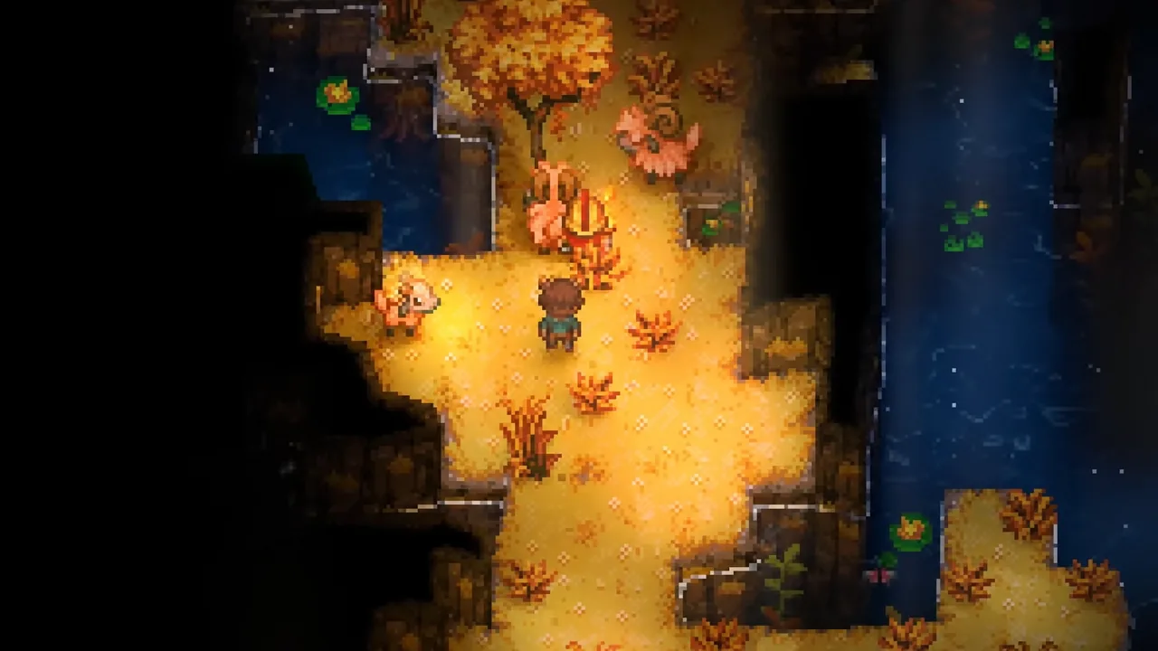 Player character standing next to a pink creature on a lit sandy patch in a cavern