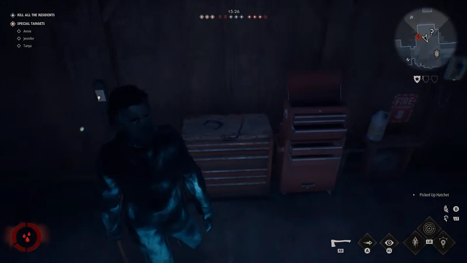 Picked Up Hatchet notification appearing as the player collects a hatchet beside tool cabinets