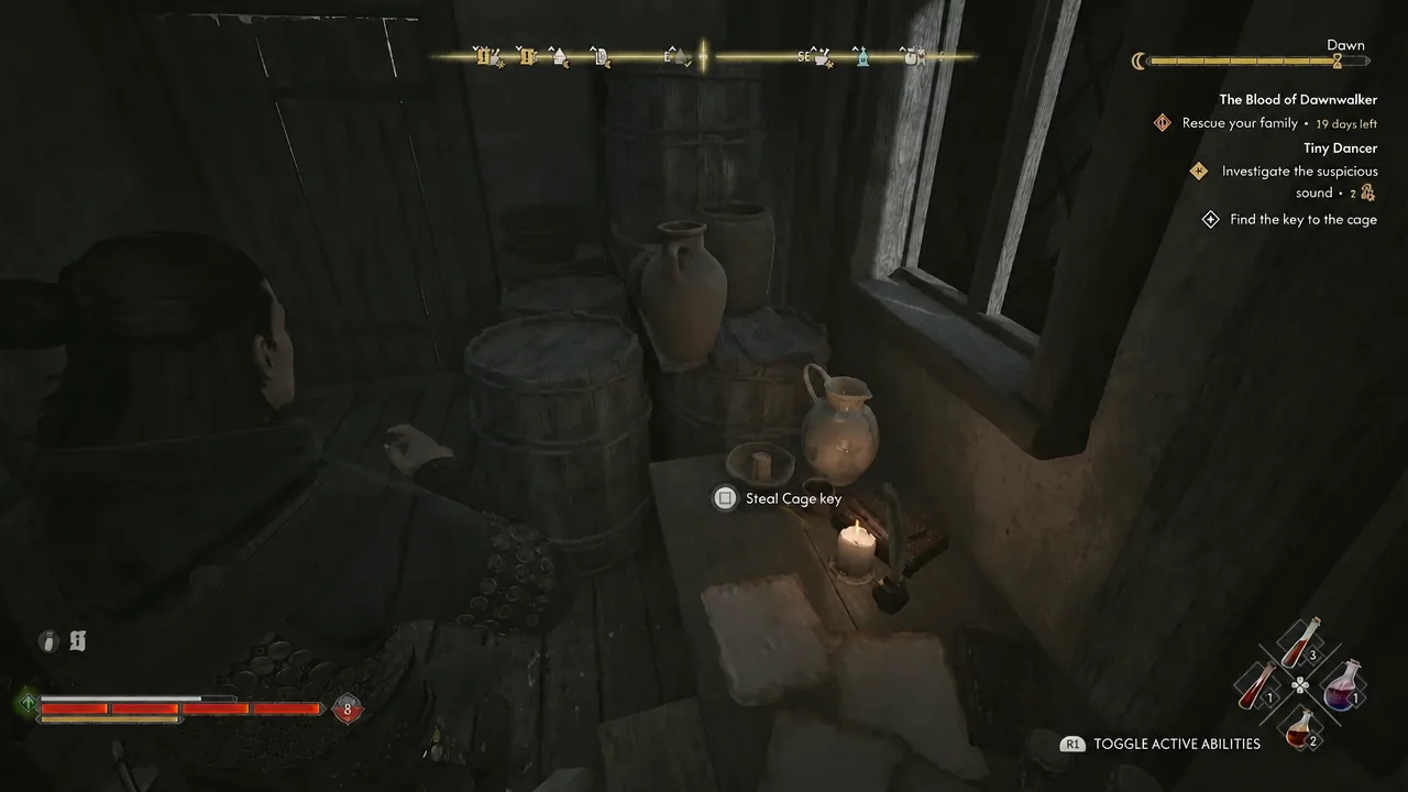 Steal Cage key prompt shown as the player reaches for the key on the candlelit upstairs table