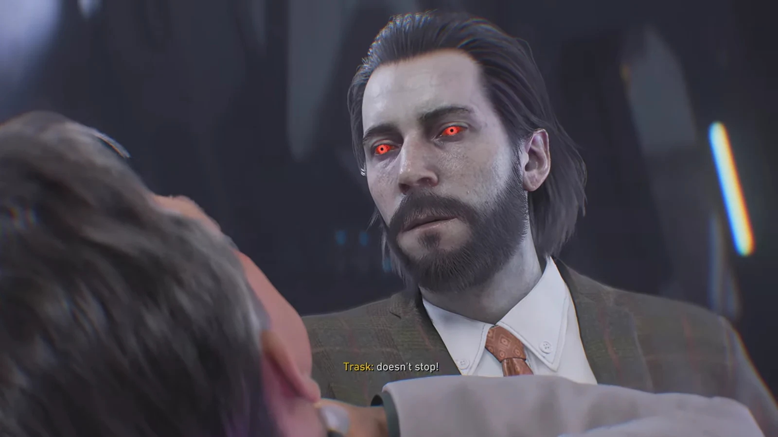 A broken Trask held in mid-air, gasping that evolution does not stop