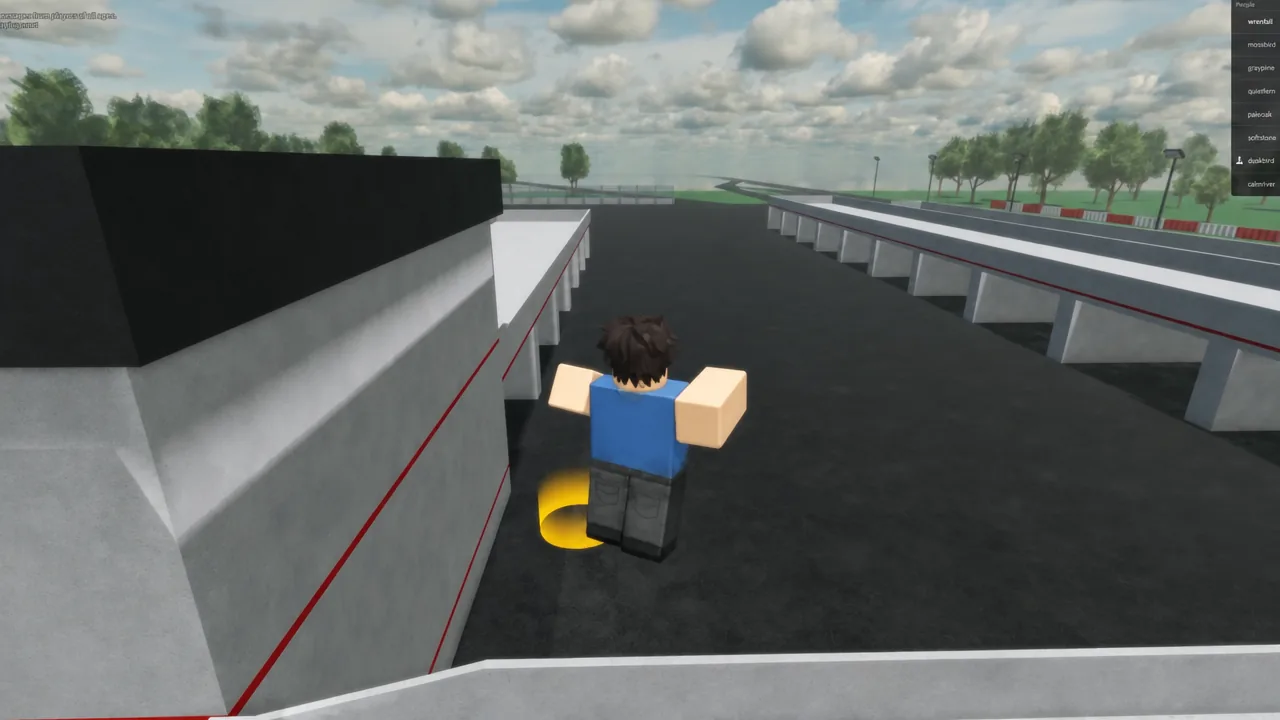 Avatar approaching the glowing yellow spawn ring between elevated track structures