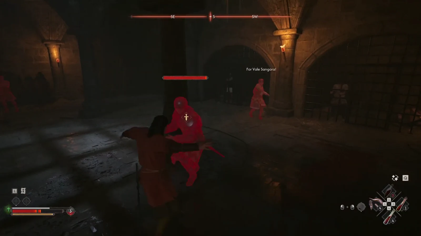 Melee fight against a highlighted jailer in the torchlit underground prison chamber