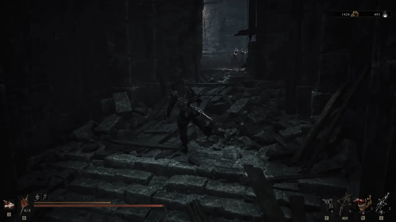 Player advancing down a dark ruined corridor toward an armored enemy inside the tomb