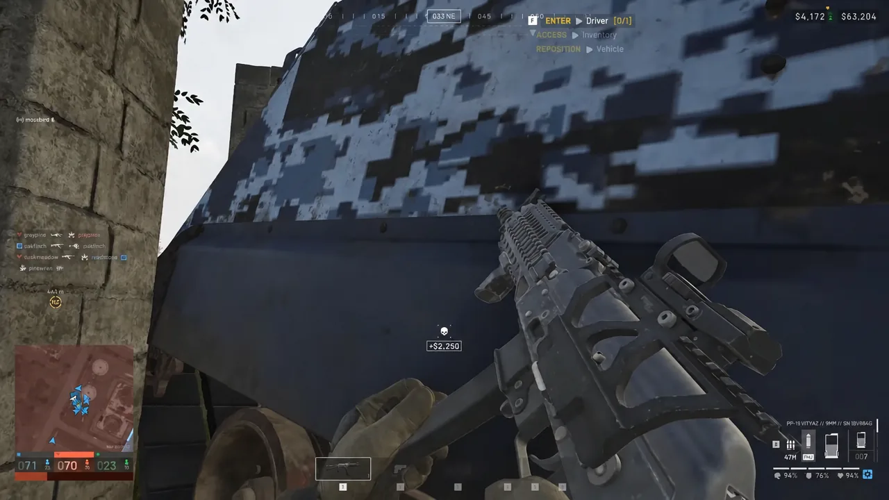 Reloading beside the vehicle with the ENTER Driver interaction prompt on screen