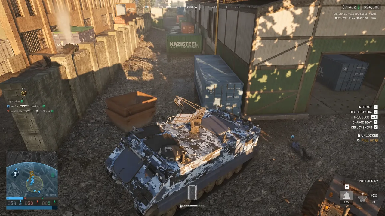 M113 APC SV vehicle HUD in a warehouse yard with the INTERACT prompt on screen