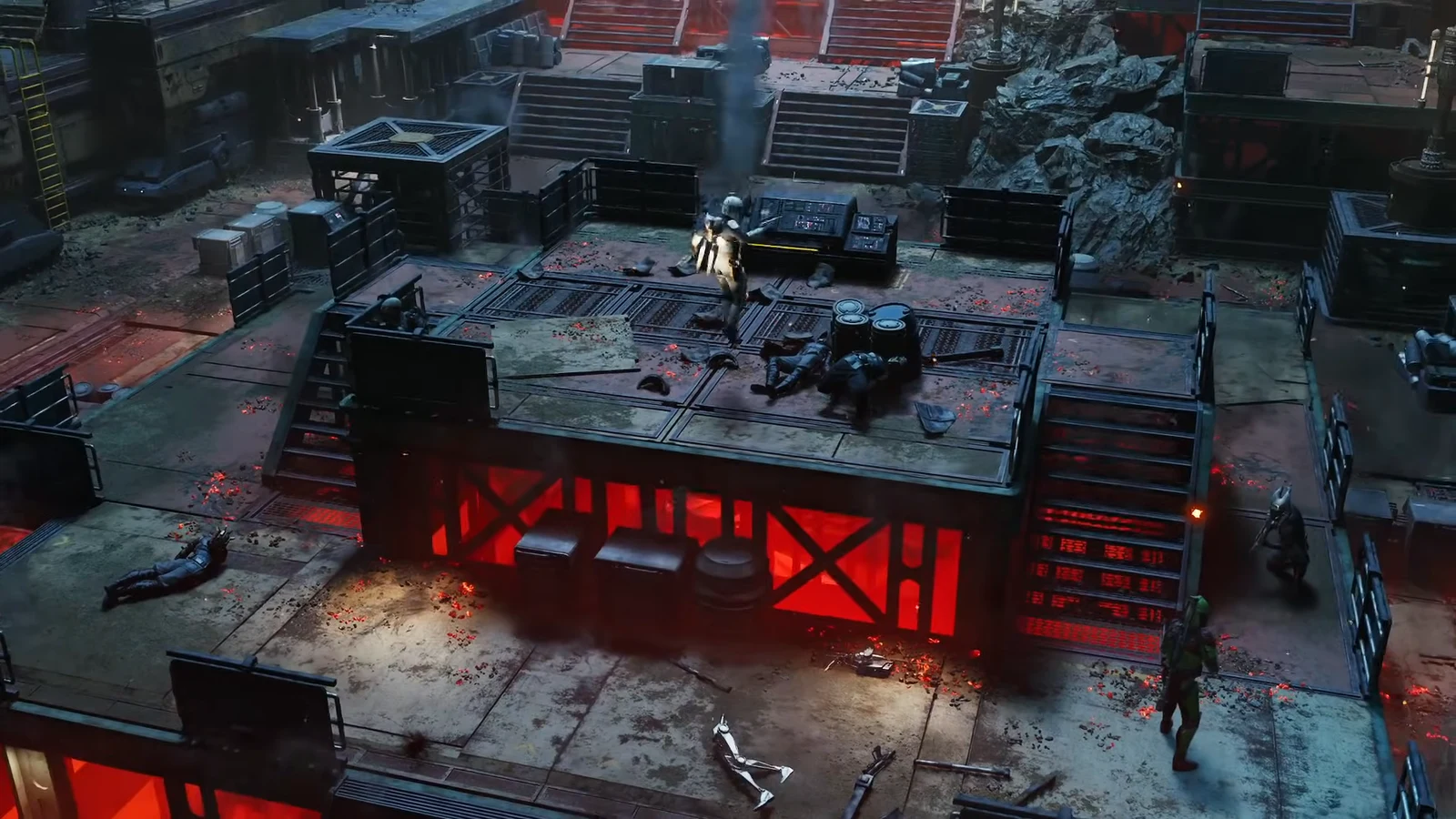 An operator working the central control console on the platform with defeated enemies scattered nearby
