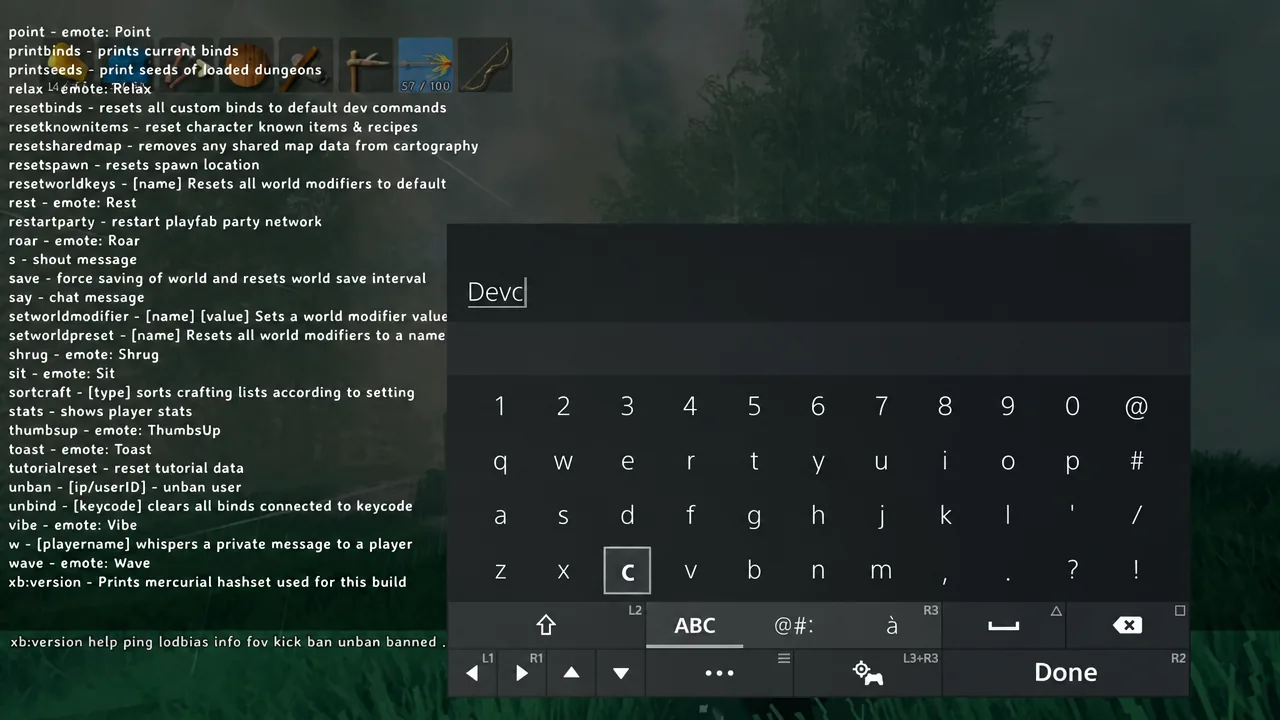 Console command field showing DevC being typed with the on-screen keyboard