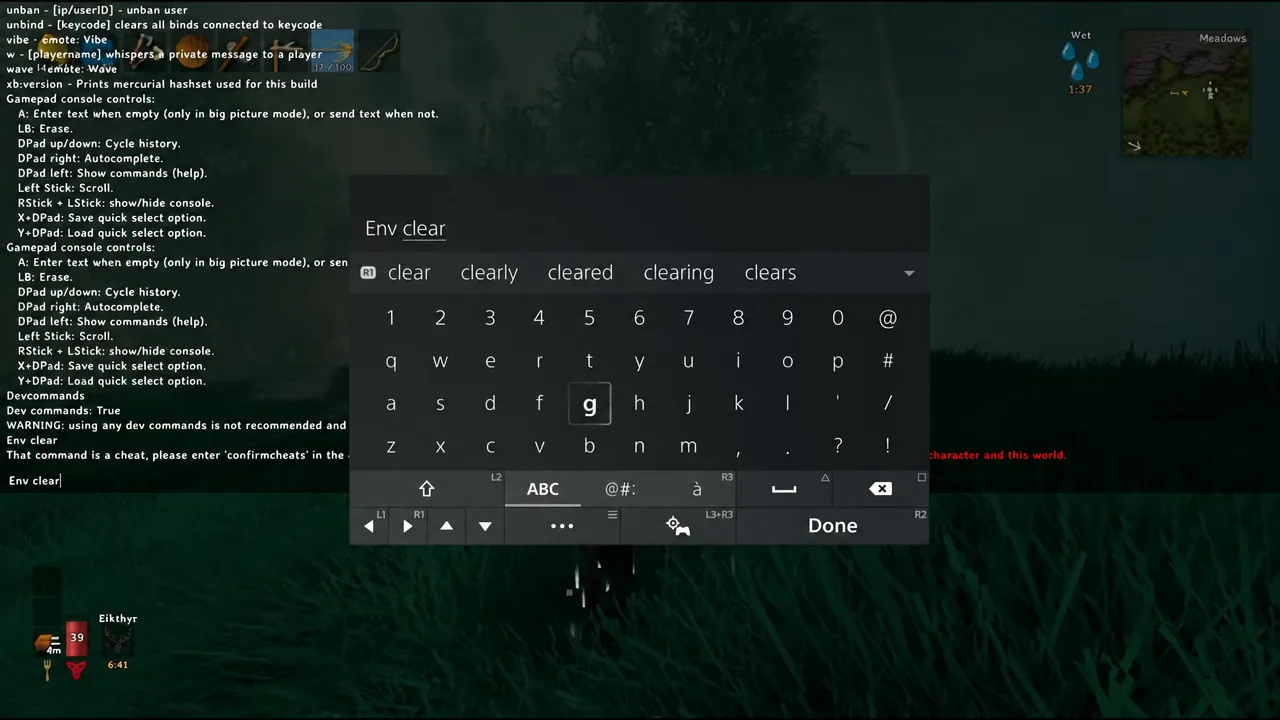 Virtual keyboard highlighted mid-input while a command is typed into the Valheim console