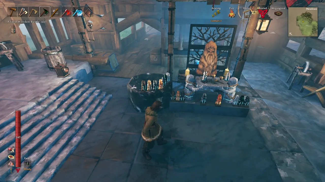 Wooden Battle Idol appearing in the player's quick-access hotbar after pickup
