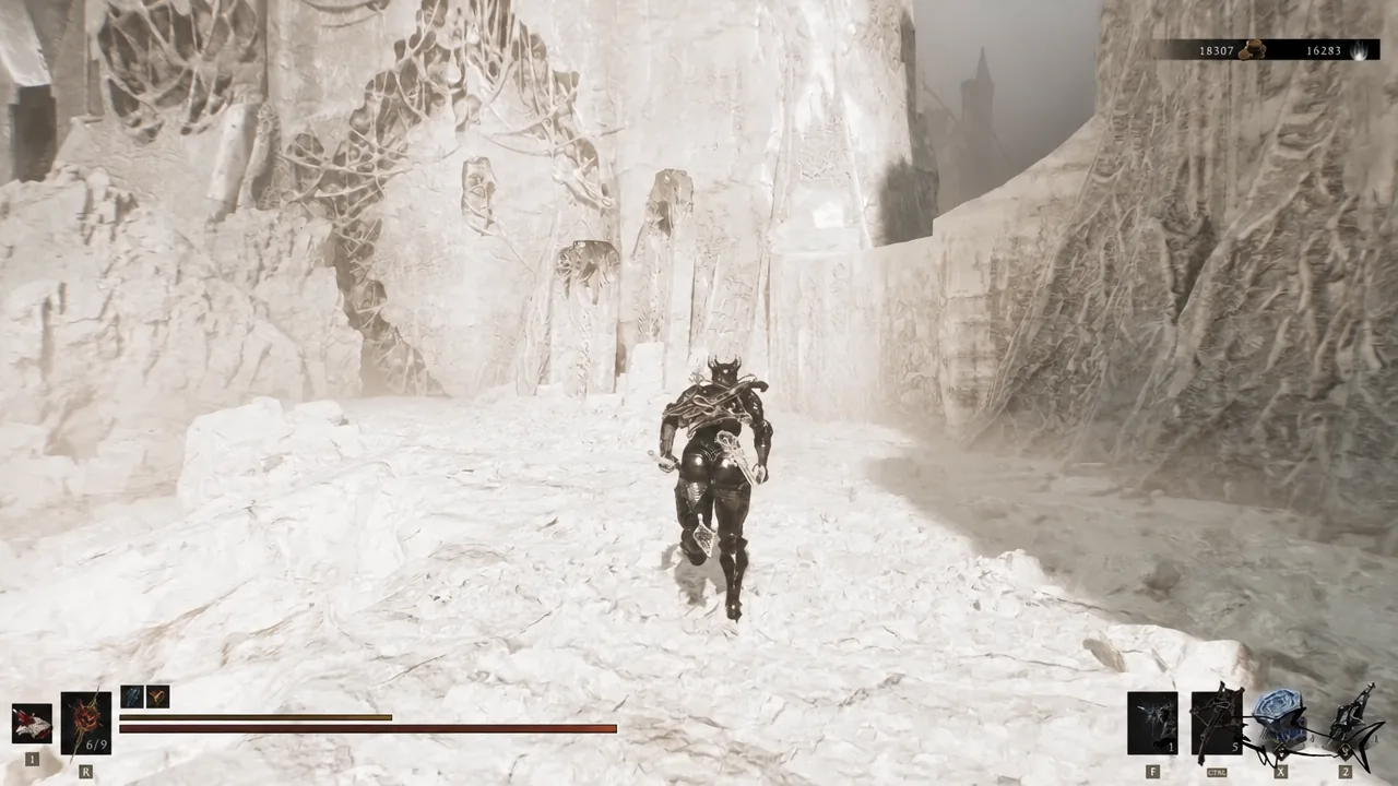 Player approaching the wide open snowfield arena where the mini-boss waits