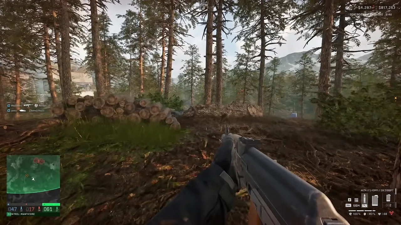 First-person view of a WARDOGS player carrying an AK-74 through forest with minimap and ammo counter