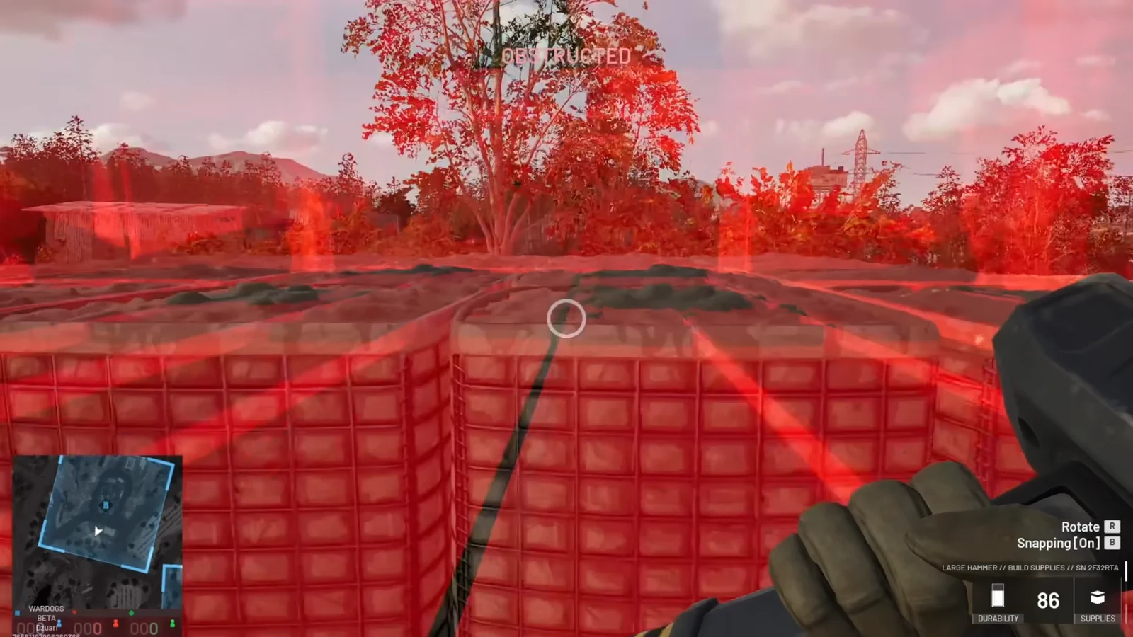 Red wall preview labelled OBSTRUCTED while using Large Hammer build mode