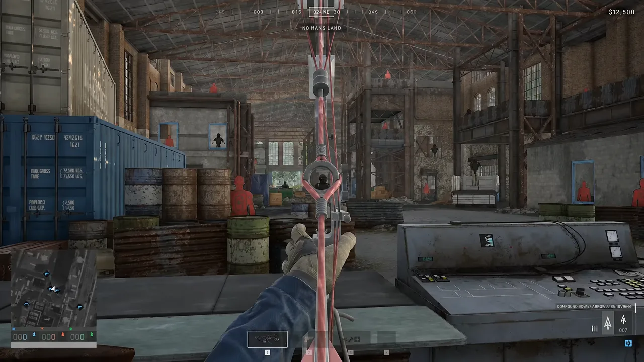 Drawn bow sighted on a target dummy on the training range