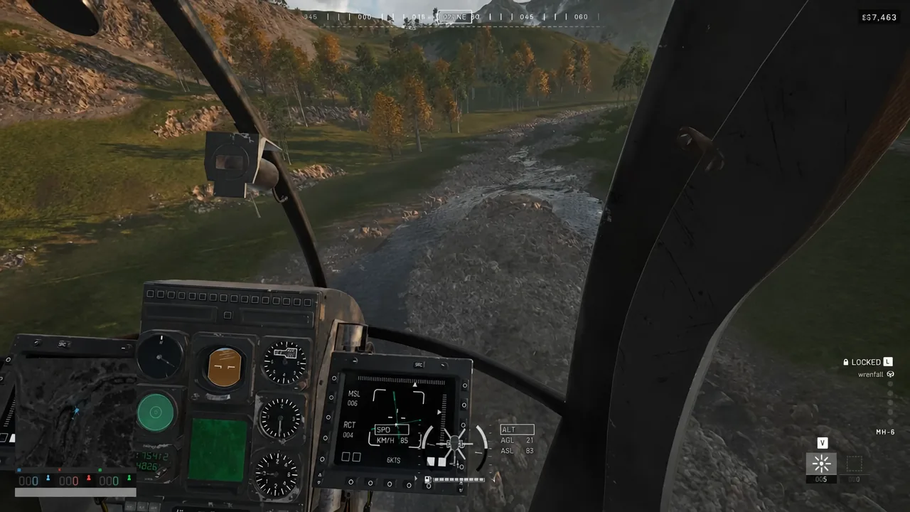 Cockpit HUD showing a LOCKED indicator during a low, fast run over a rocky stream