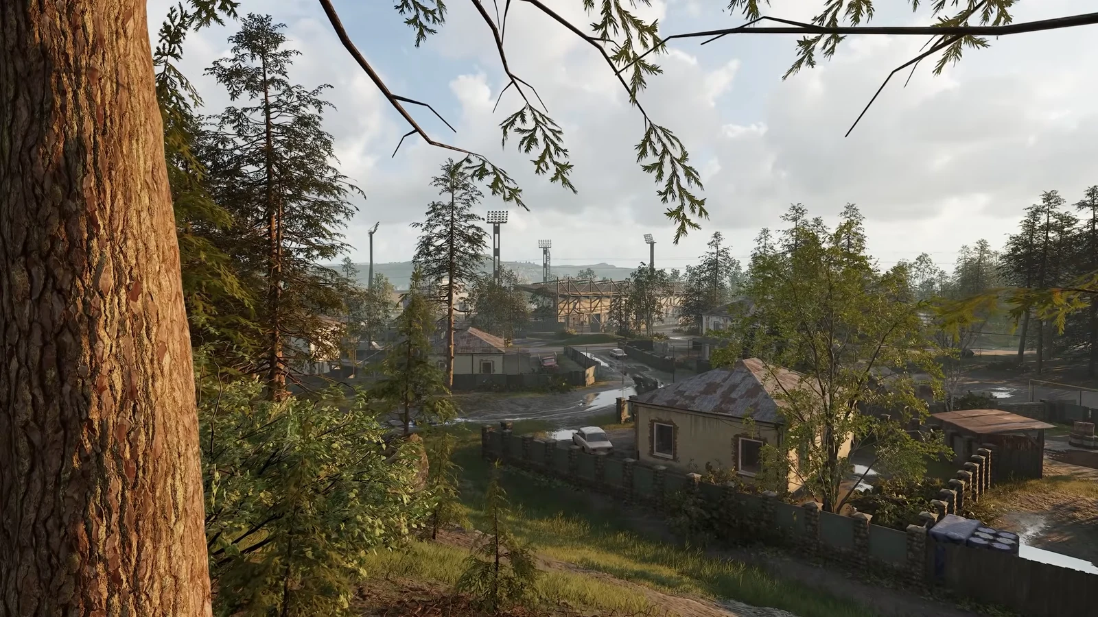 Another frame from the Wardogs Season 2 teaser showing the village under cloud