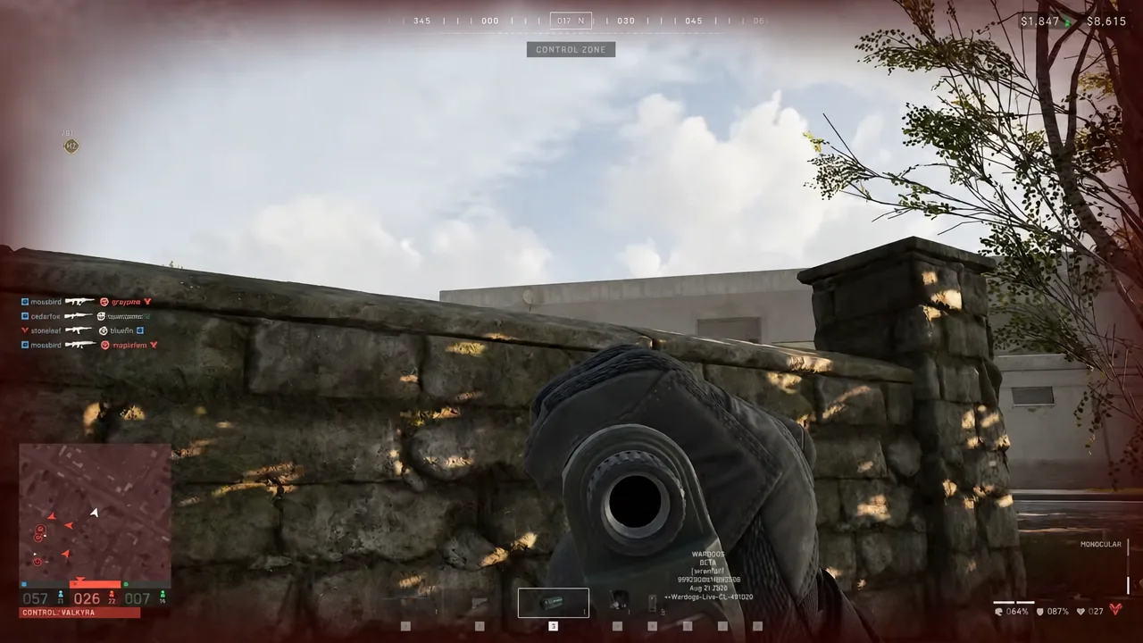 Player aiming a scoped weapon over a stone wall during a Control Zone fight