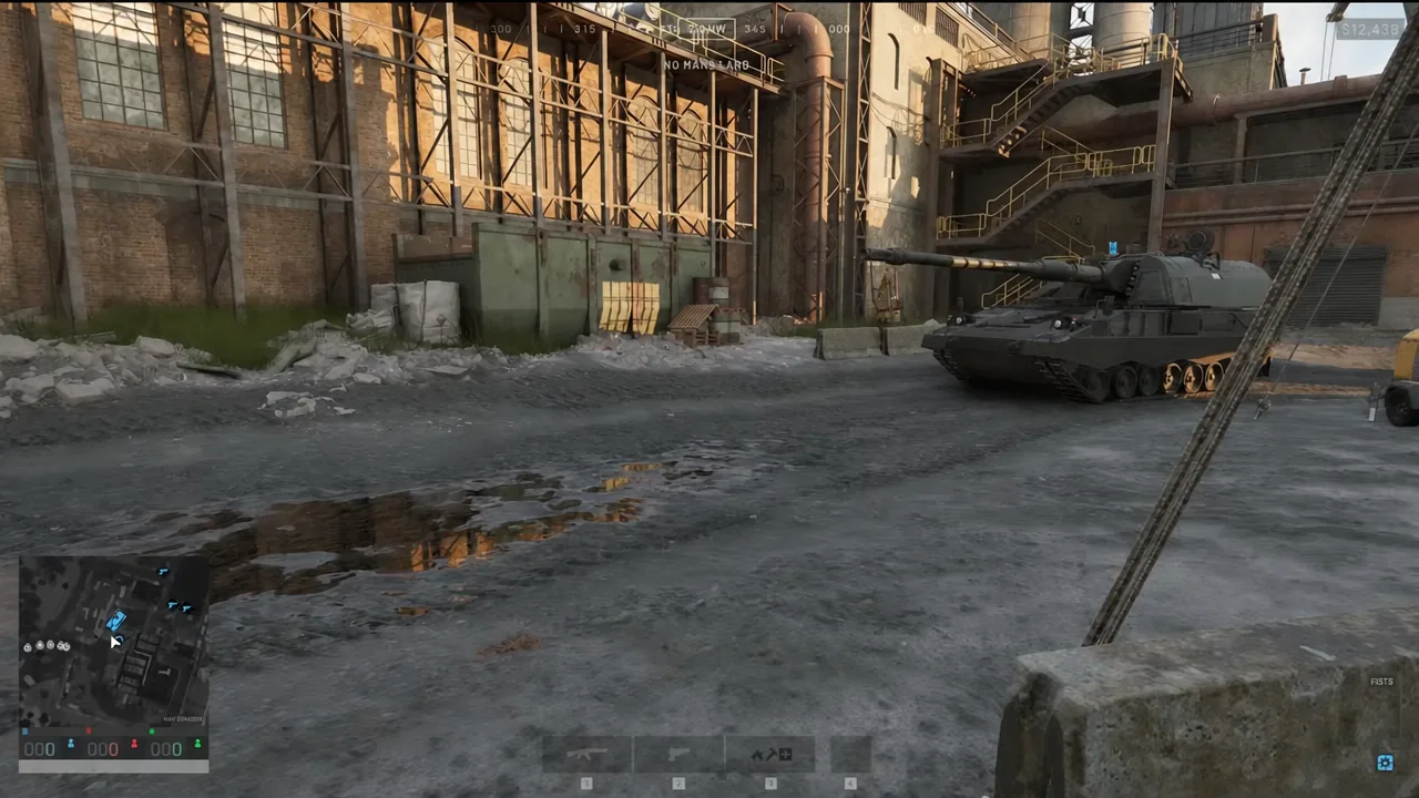 Player on foot with fists equipped looking at a tank parked in an industrial yard