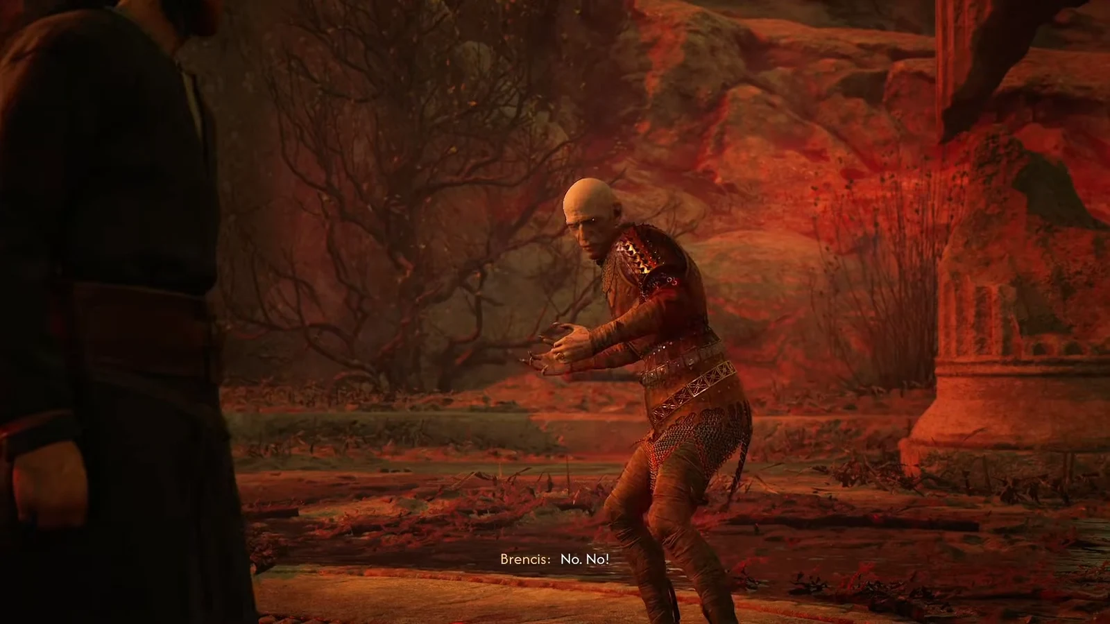 Brencis kneeling in the arena during the post-fight conversation with Coen