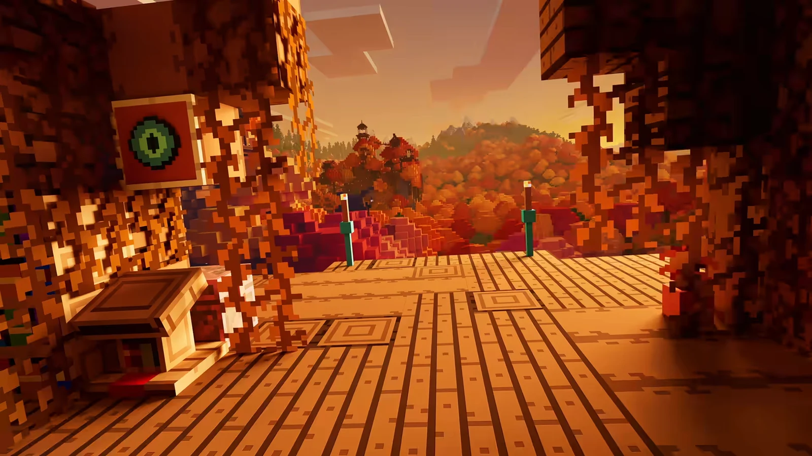 Characters crossing wooden rope bridges through giant autumn trees in the Minecraft Live trailer