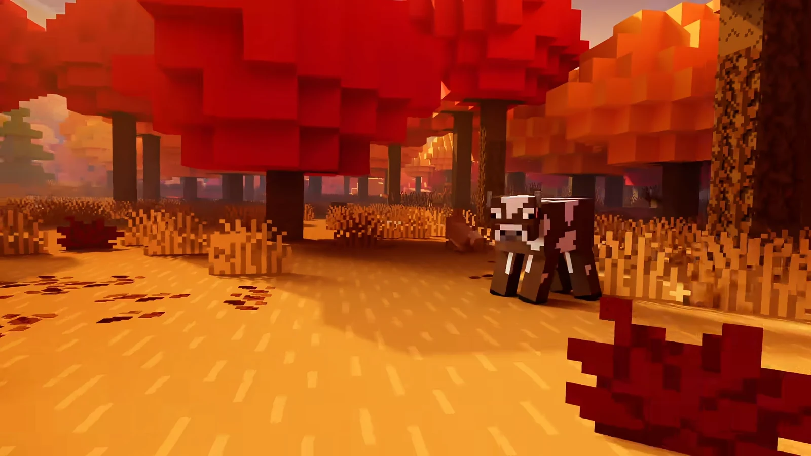 A group of Minecraft heroes running together across golden fields in the event trailer
