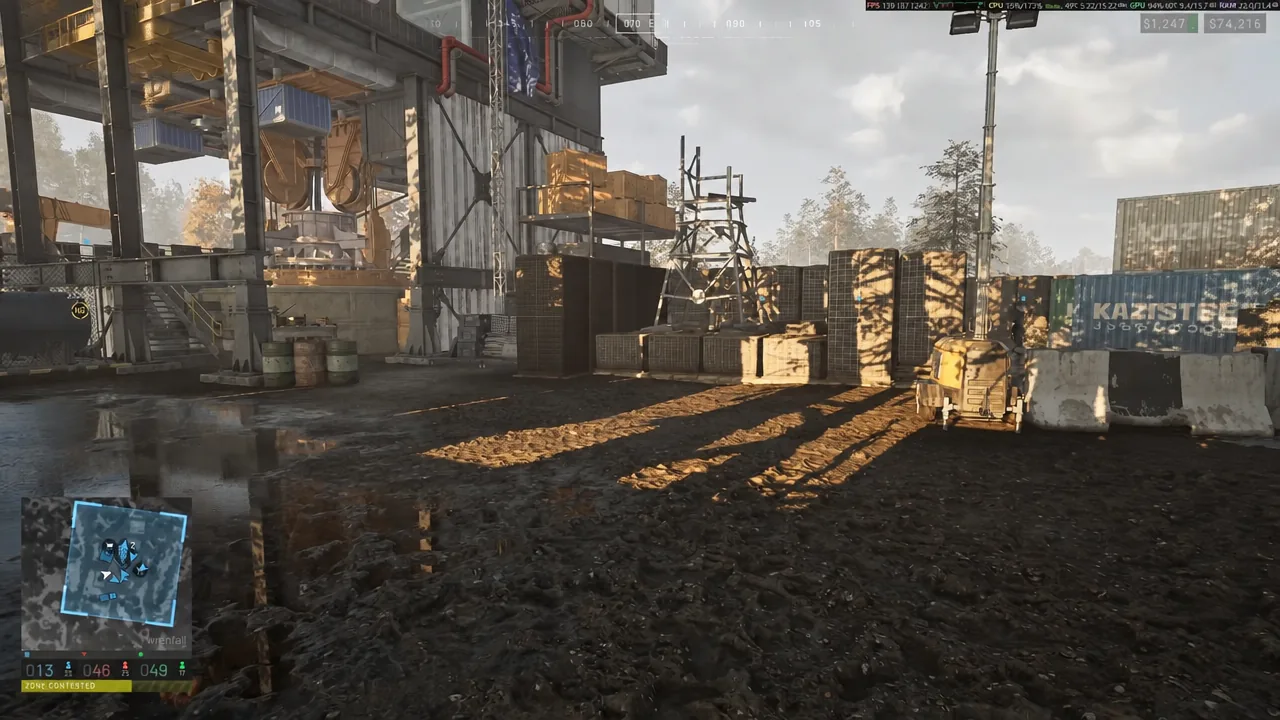 First-person view crossing an industrial yard toward the fighting, minimap in the lower left