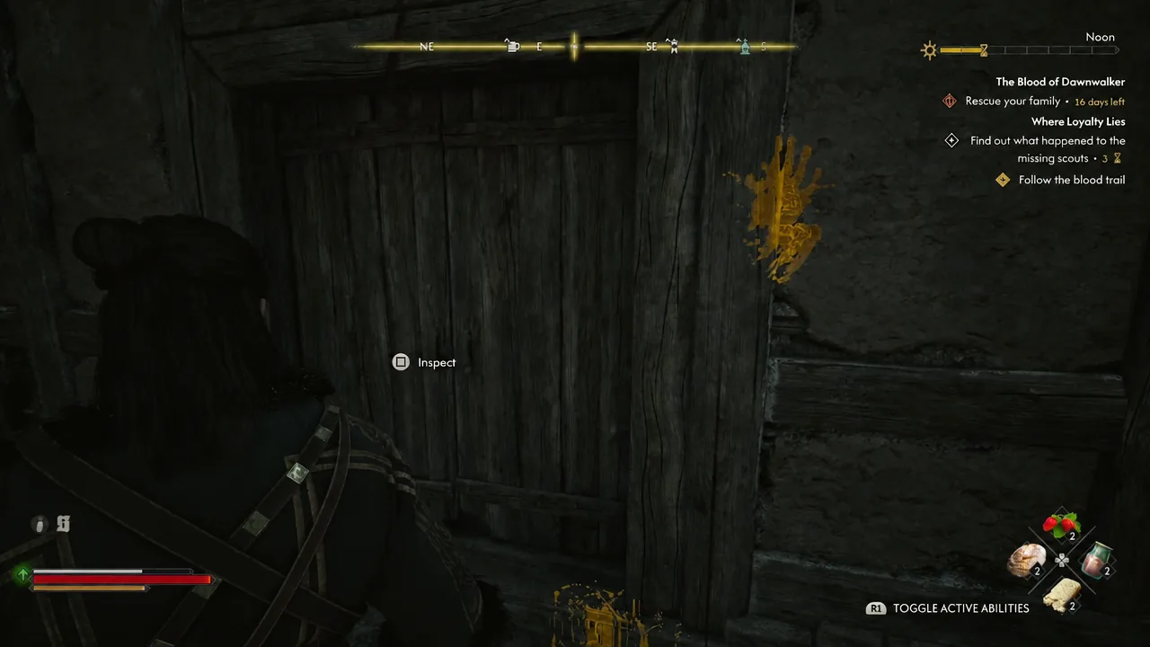 The Inspect prompt highlighted on the locked wooden warehouse door at the end of the blood trail.
