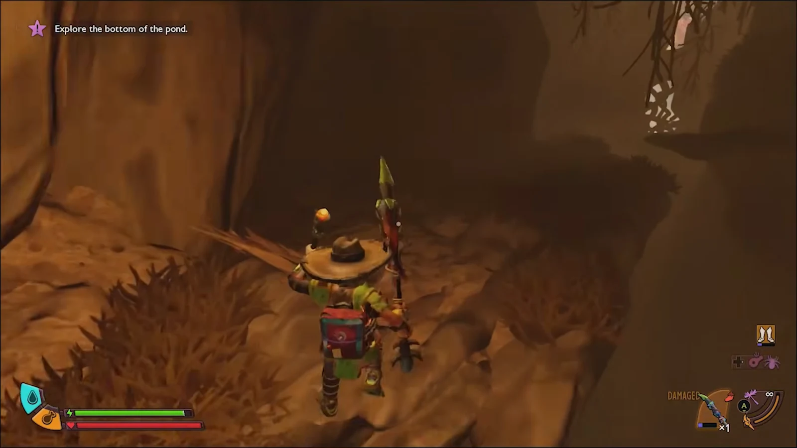 Character moving across dark muddy ground with an on-screen objective tracker visible