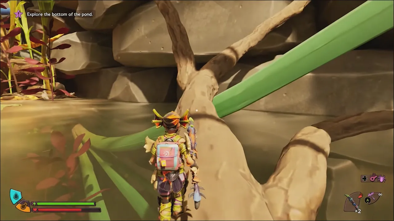 Player walking up the large twig at Skunk Pond with the pond objective shown on screen