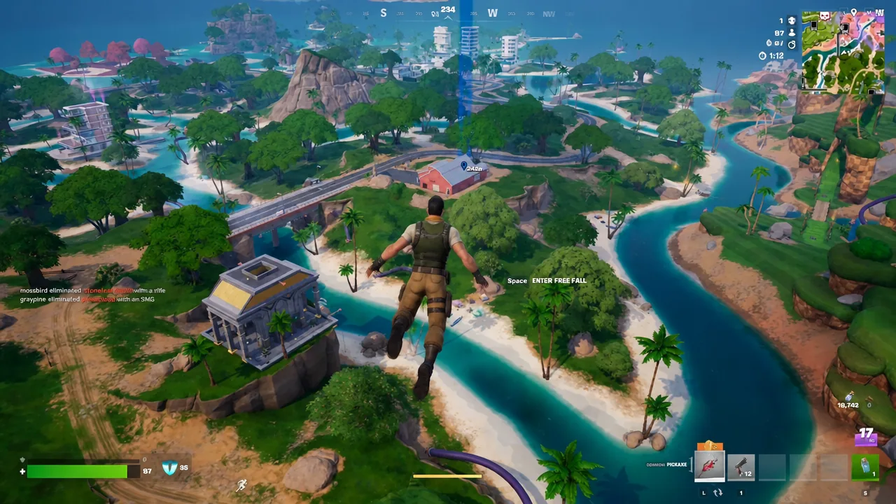 Skydiving over the island with the free fall button prompt on screen